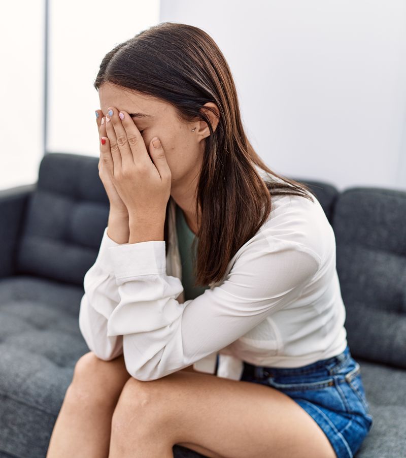 Young hispanic woman stressed