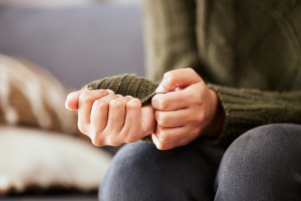Woman at a therapy session feeling anxious